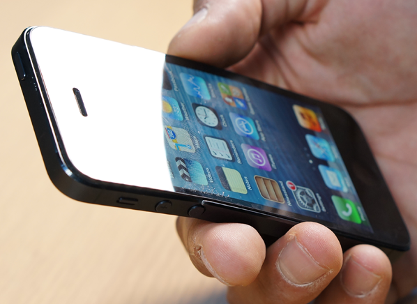 CRO_Electronics_Bent_iPhone_in_Hand_09-14